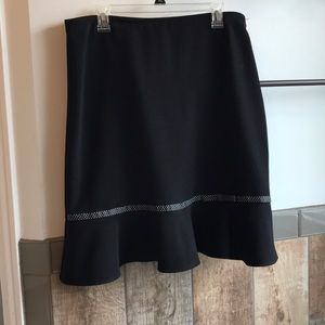 Black skirt with polka dot ribbon trim
